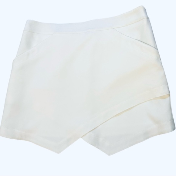 BCBG mini skirt size small asymmetrical in excellent like-new condition - Picture 4 of 4